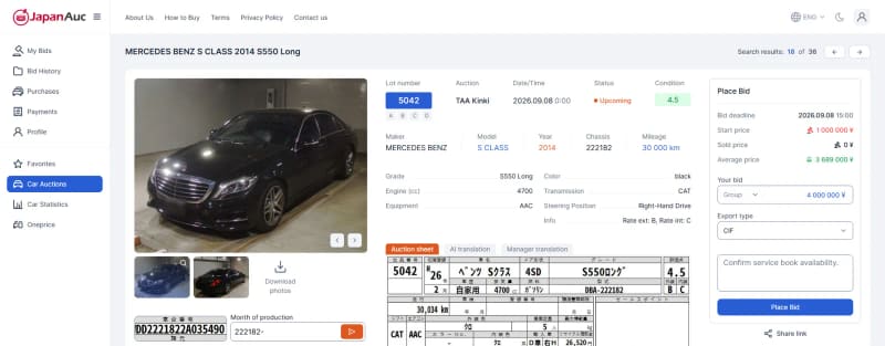 Lot detail page with translated auction sheet and place bid panel